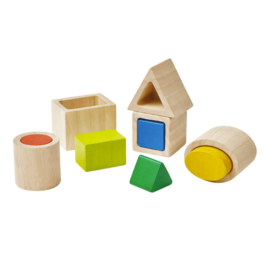 Cajas para encajar formas geométricas Plan Toys